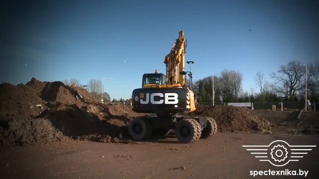 Колесный экскаватор JCB в действии. Это надо видеть!