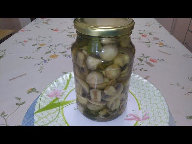 Шампиньоны маринованные.
